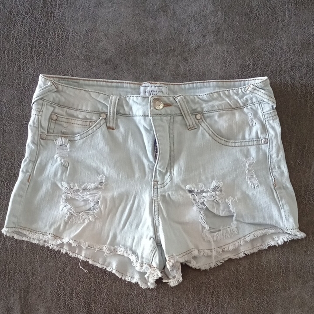C) Celebrity Pink Faded Blue Ripped Jean Shorts